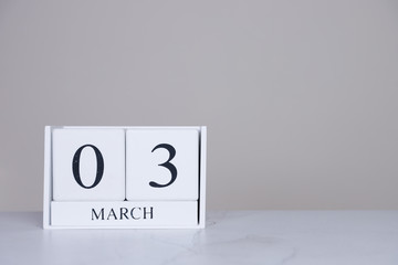 March Date Cube White Background