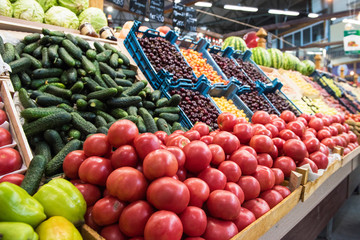 Vegetable farmer market counter: colorful various fresh organic healthy vegetables at grocery store. Healthy natural food concept