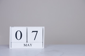 May Date Cube White Background