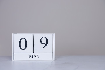 May Date Cube White Background