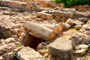 Fototapeta premium Destroyed ancient stone ruins. Archaeological excavations.