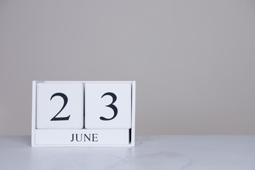 June Date Cube White Background