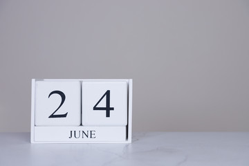 June Date Cube White Background
