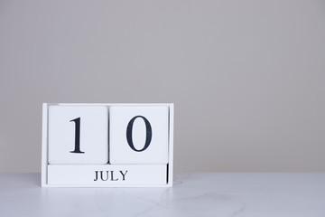 July Date Cube White Background