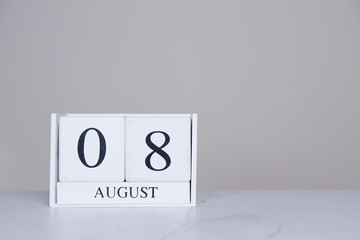 August Date Cube White Background
