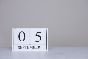 September Date Cube White Background