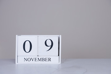 November Date Cube White Background