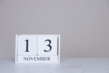 November Date Cube White Background