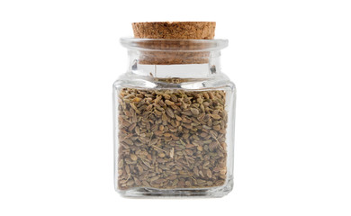 anise seeds in glass  jar on isolated on white background. front view. spices and food ingredients.