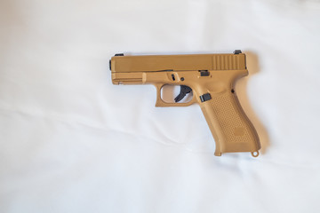 Handgun without magazine on white background