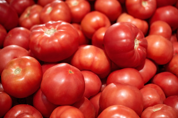 Fresh tomatoes texture on a shop window