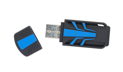 Fototapeta premium Side view of USB memory stick isolated on white