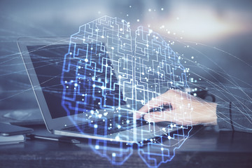 Man typing on keyboard background with brain hologram. Concept of big Data. Double exposure.