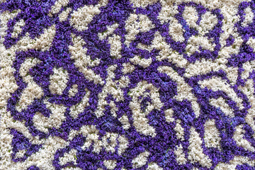 Abstract background consisting of white and blue flowers.