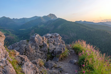 Fototapeta na wymiar Mountain landscape at sunset, Zakopane, Poland, High Tatras, Nosal Mount, view of peak Giewont