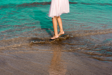 Splashing fun time for a child in the seaside