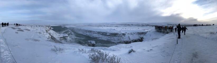 winter mountain landscape with frozen lake and snow