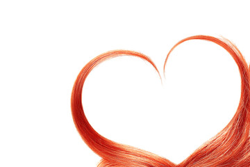 Red hair in shape of heart, isolated on white background