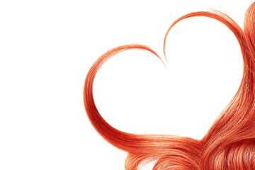 Red hair in shape of heart, isolated on white background