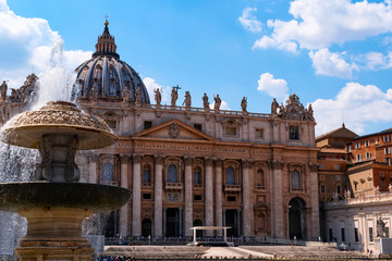 The Papal Basilica of St. Peter in the Vatican with the Bernini Fountain in the foreground. Rome,...