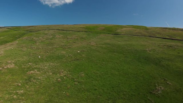 Flying towards a lush green hillside at the Barbon Beck Valley, Carnforth, Lancashire. Taken in June to capture the best of the nature in the area at this time of year. 