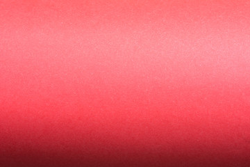 red roller made with curved sheets of paper background texture