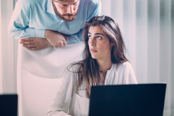 Pressure at Work. Boss Pressures New Female Worker.