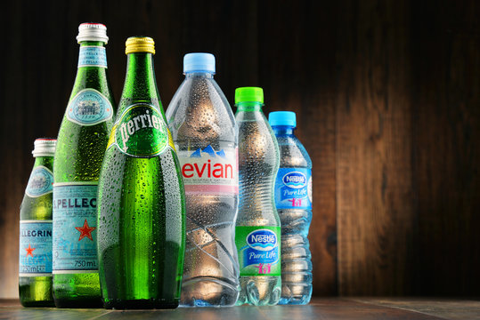Bottles of assorted global mineral water brands
