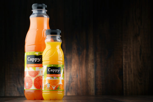 Two bottles of Cappy fruit juices
