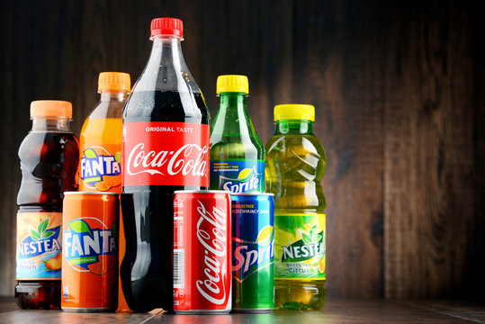 Bottles of assorted Coca Cola Company soft drinks