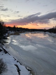 Fototapeta premium sunset over frozen lake