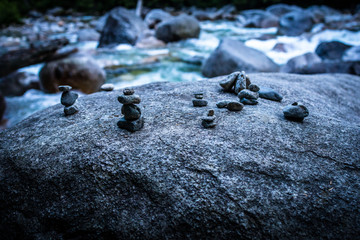 Little rock formations found on large rock in creek