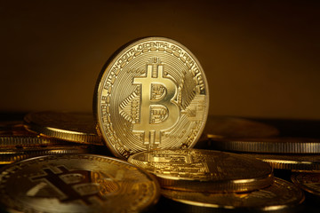 Golden Bitcoin on dark backround. New virtual money. Crypto currency