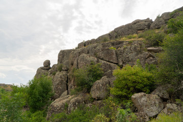 Large granite canyon. Village Aktove. Ukraine. Beautiful stone landscape.