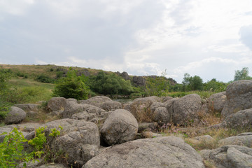 Large granite canyon. Village Aktove. Ukraine. Beautiful stone landscape.