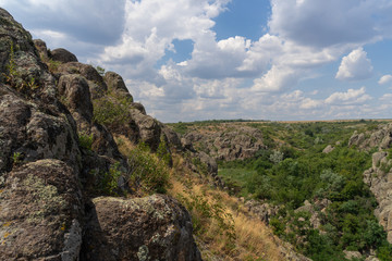Large granite canyon. Village Aktove. Ukraine. Beautiful stone landscape.