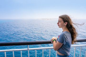Girl in boat railing at Formentera Ibiza