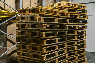 stack of wood pallet in factory warehouse