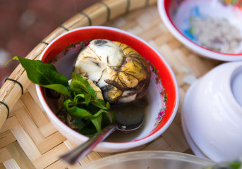 Fermented balut egg in a bowl