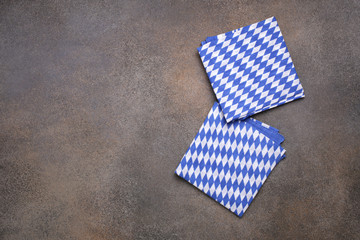 Bavarian napkins on grunge background. Oktoberfest background concept