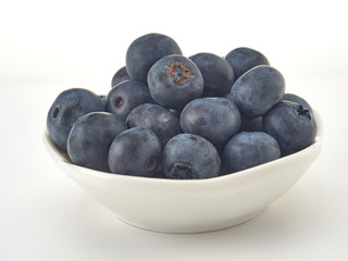 Delicious juicy ripe blueberries .On different background
