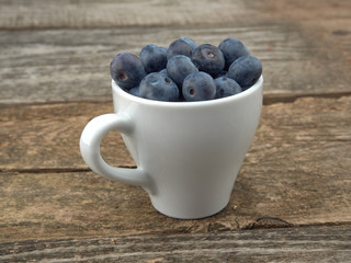Delicious juicy ripe blueberries .On different background