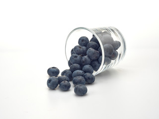 Delicious juicy ripe blueberries .On different background