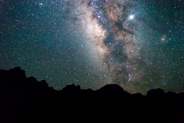 The Milky Way rising over the Chisos Basin in Big Bend National Park (Texas).
