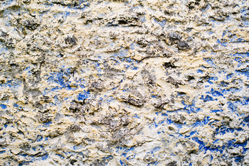 Ancient wall, old laying of walls from a stone. Textural grunge background