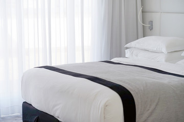 Modern bedroom interior in the hotel.