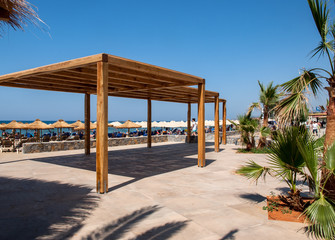  Sunbeds at the beach in Malia on Crete, Greece