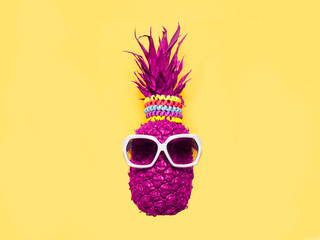 Creative pineapple with sunglasses on yellow background, summer vacation beach idea design pattern, copy space, close up, blank for text