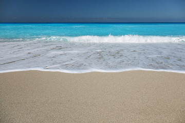 Fototapeta na wymiar Sandy beach with white sand and turquoise sea water on the island of Lefkada, Greece