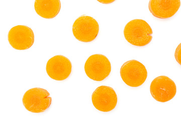 Lot of pieces of peeled orange baby cut carrot flatlay isolated on white background